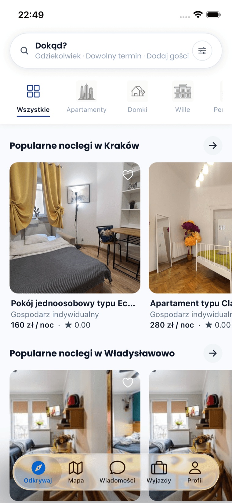 Aplikacja Zabookuj na iPhonie — ekran główny z noclegami